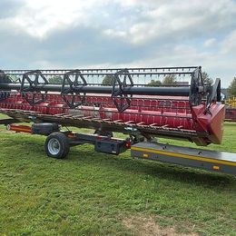 Case IH Axial-Flow 6150 inkl. 6,70 m Schneidwerk und Wagen